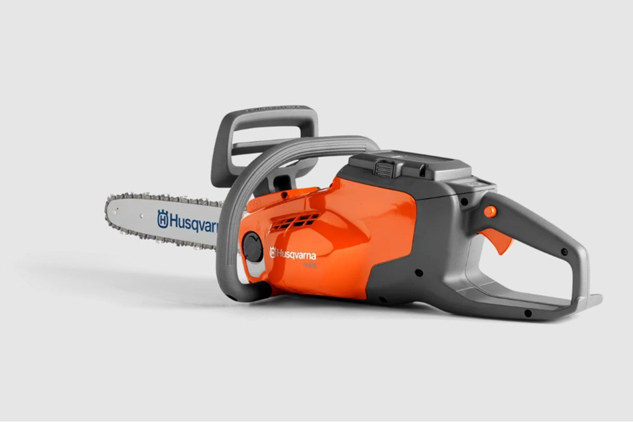 Husqvarna chainsaw on a light gray background