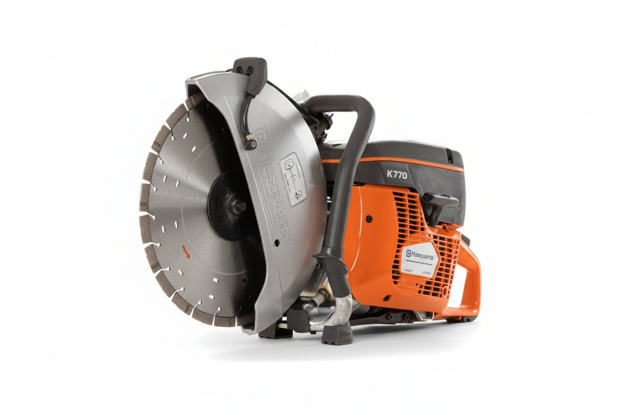 A Husqvarna K770 cordless diamond saw cut-off machine with an orange and black engine housing, a large silver circular saw blade, and a black handle, shown on a light gray background.