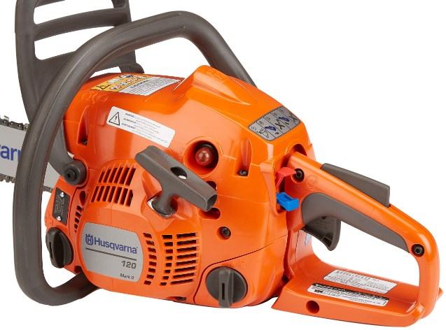 Husqvarna 120 chainsaw with a bright orange body, dark gray handles, and a silver guide bar, shown on a plain white background.